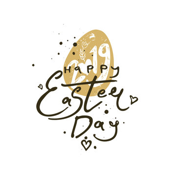 Happy Easter Day. Calligraphic logo hand drawn with ink brush. Easter 2019 vector template with gift easter egg. Flat design golden egg and handwritten wish phrase.