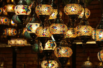 Traditional bright decorative hanging Turkish lamps and colourful lights with vivid colours  in the Istanbul Bazaar, Turkey