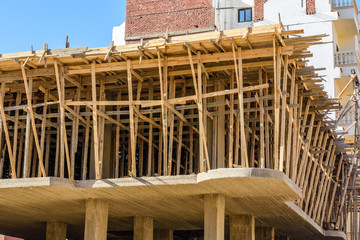 Construction of the new modern residential building, wooden framework. Hurghada, Egypt