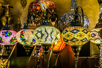 Traditional bright decorative hanging Turkish lamps and colourful lights with vivid colours  in the Istanbul Bazaar, Turkey