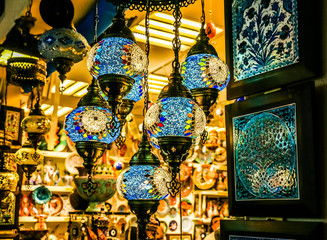 Traditional bright decorative hanging Turkish lamps and colourful lights with vivid colours  in the...
