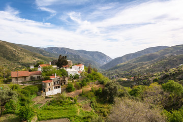 Fototapeta na wymiar Crete island. Houses in valley between the hills. Rural landscape. Greece.