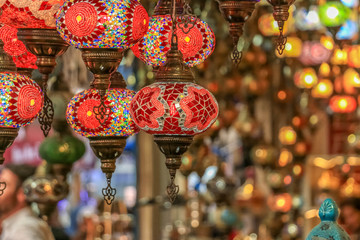 Traditional bright decorative hanging Turkish lamps and colourful lights with vivid colours  in the Istanbul Bazaar, Turkey