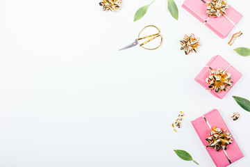 Festive flat lay arrangement pink gift boxes