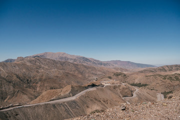 A winding road through the atlas mountains in Morocco.