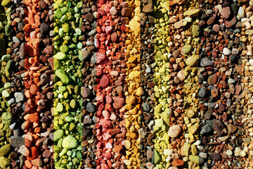 pebble and seaside stones in the sunny bright day on the beach, tinted for design and background