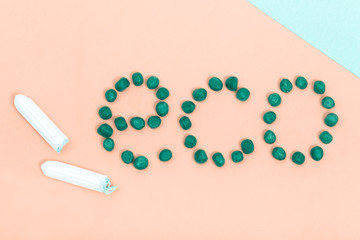 Tampons on creative colour background