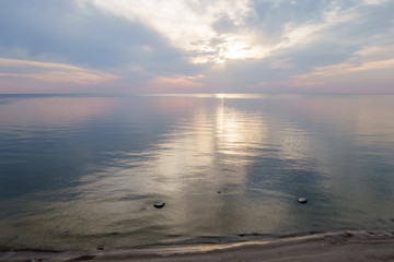 Sea water reflection on sunset