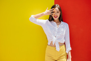 Portrait of an asian girl standing outdoors