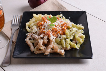 Busiate tricolore, pasta dish with puttanesca sauce