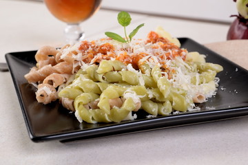 Busiate tricolore, pasta dish with puttanesca sauce