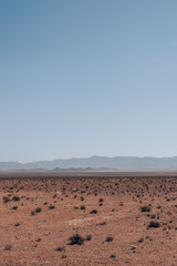 Fototapeta na wymiar Steppe in Morocco, Africa with the Atlas Mountains in the far back