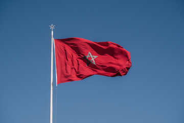 Flag of Morocco waving in a strong wind