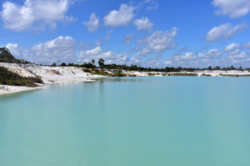 Clear blue Kaolin Lake, Belitung Island in Air Raya Village, Indonesia