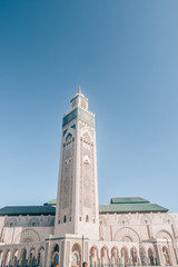 Fototapeta premium Hassan II Mosque in Casablanca, Morocco, Africa with a beautiful blue sky