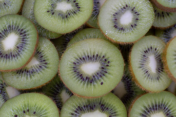 slices of kiwi on a cutting board
