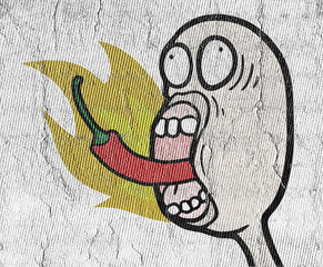 eating hot spicy chilli