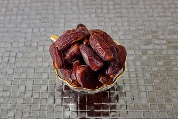 Palm Dates on silver floor