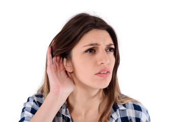 Woman trying to listen something