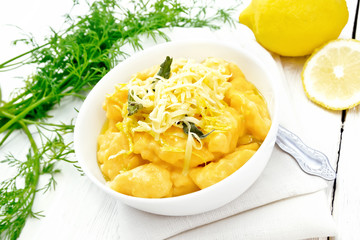 Gnocchi pumpkin in bowl on light board