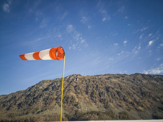 red flag on a blue sky