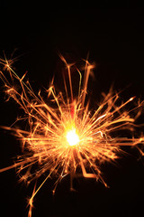 yellow sparks on a black background