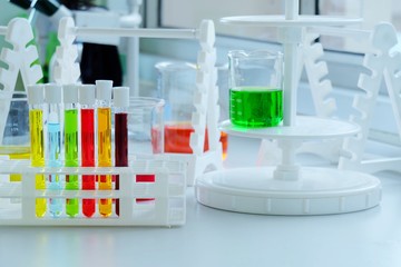 Chemical tube set development and pharmacy in laboratory  with multicolored substances in laboratory - Image