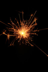 yellow sparks on a black background