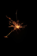 yellow sparks on a black background