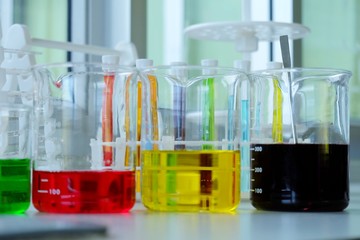 Chemical tube set development and pharmacy in laboratory  with multicolored substances in laboratory - Image