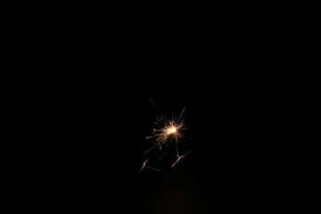 yellow sparks on a black background