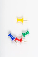 Colored pushpins, office supplies, close-up