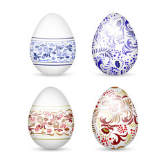 Easter eggs, painted in traditional Russian ornaments Khokhloma and Gzhel, on an isolated background.