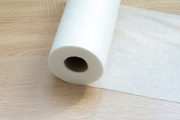 a roll of white cloth unwound