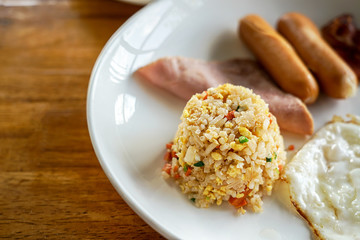fried rice with bacon sausages. 