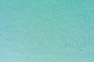 Abstract surface water waves in the sea with reflections. Natural the texture for background