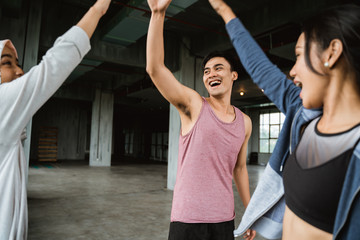 friend sport shake hand in the gym after exercising together
