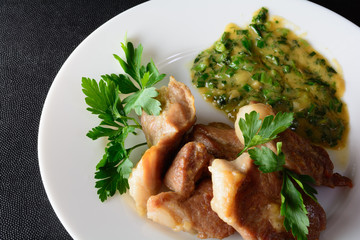 Meat on a white dish. Healthy food.