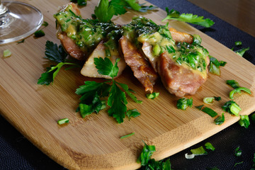 Meat on a wooden board with sauce. Healthy food