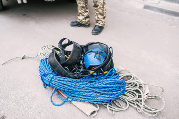 Blue fireman's or rescuer's helmet with equipment. Closeup photo