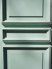 turquoise colored wooden door with space for text