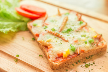Insect food - Woodworm, Edible insects with carrots, peas, corn, mozzarella cheese, sliced bread.