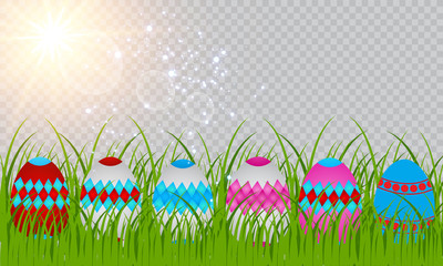 Easter eggs on the green grass. Seasonal holidays in April. Colorful egg and flowers.Banner