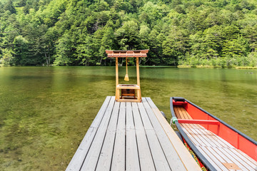 Myojin pond at Hotaka Rear Shrine in Kamikochi, Nagano, Japan.