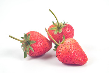 Group of Strawberries on white background.