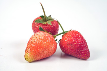 Group of Strawberries on white background.