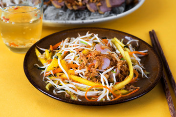 Asian vegetable salad with nuts.