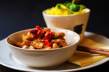 Turkey with, pepper and turmeric rice.