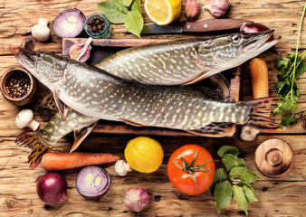 Fish pike on the kitchen board