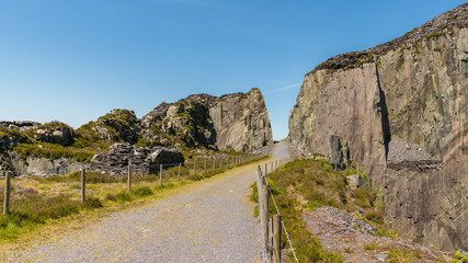 Fototapeta na wymiar Walking in the derelict Dinorwic Quarry near Llanberis, Gwynedd, Wales, UK